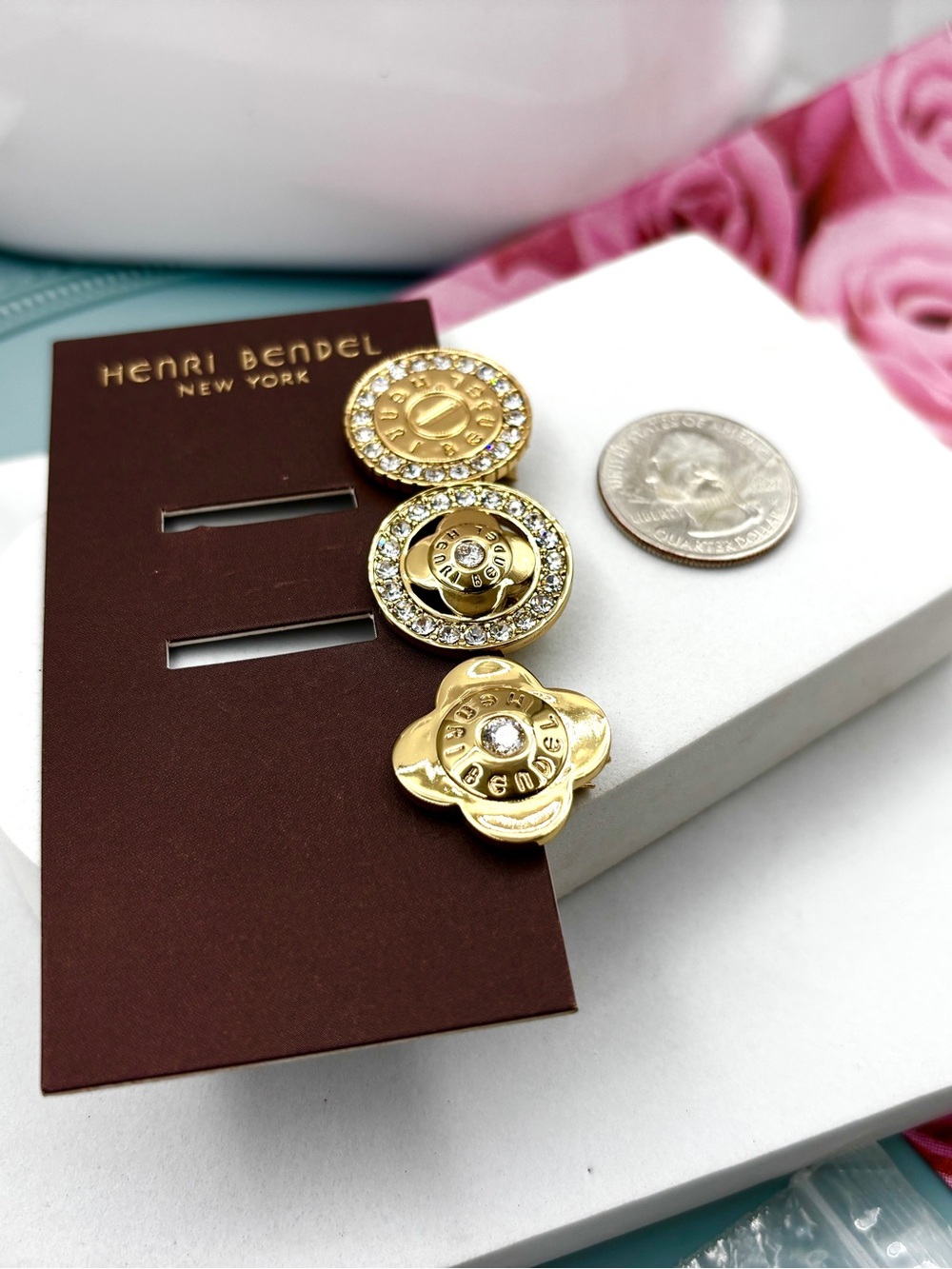 Set Of Three Henri Bendel Classic gold tone crystals logo hair pins